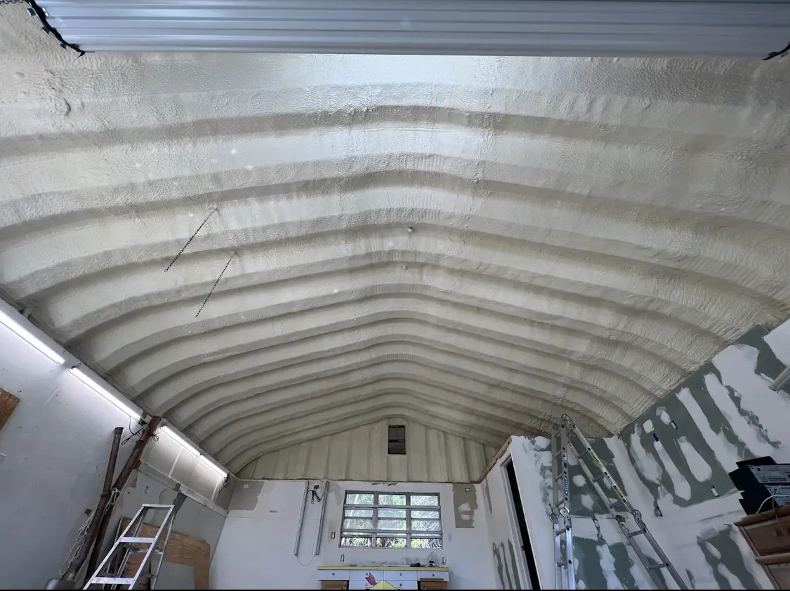 Spray polyurethane foam applied to the underside of a metal roof deck in North Fort Lewis
