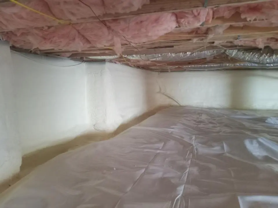 Crawl space encapsulation with closed-cell spray foam for Commercial Roof Restoration in North Fort Lewis